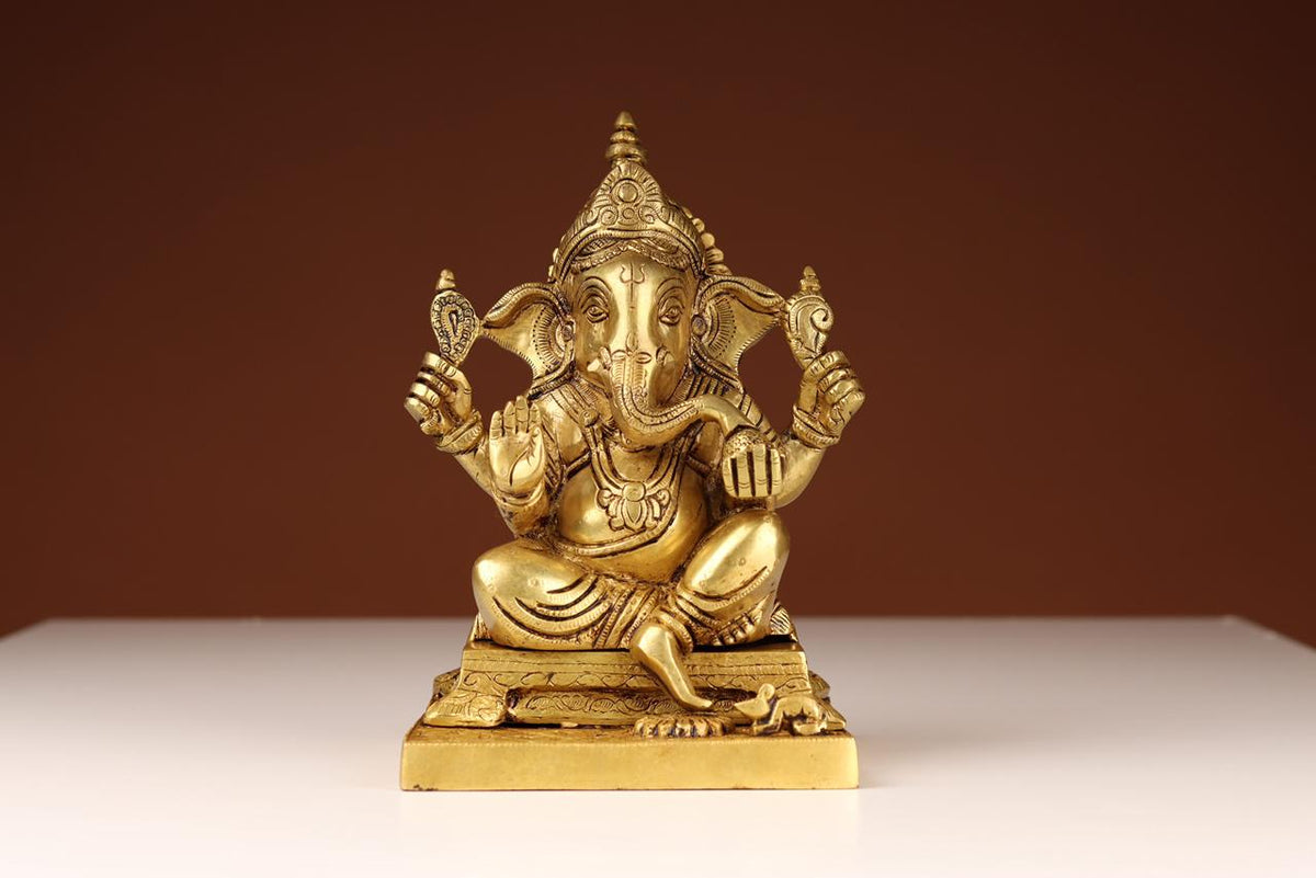 Brass Ganesha Idol Seated on Pedestal | Gold Polished Ganpati Statue